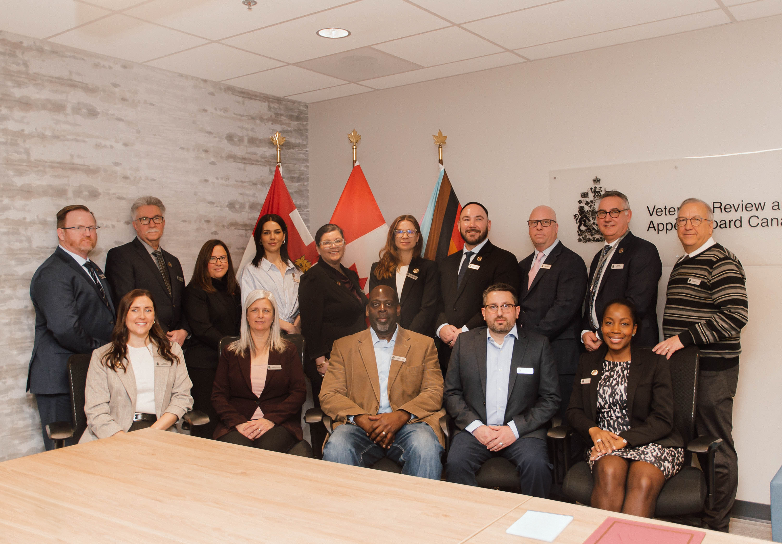 A group of individuals posing after being inducted as new Board Members.